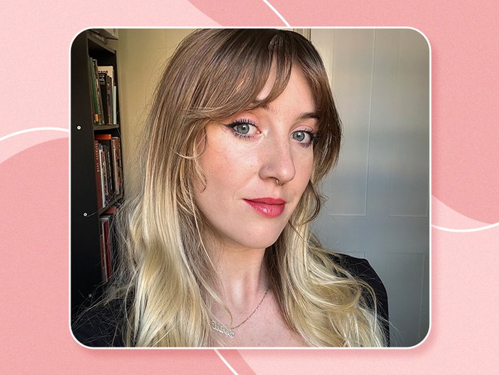 Picture of an editor with dirty blonde hair and bangs against a red graphic background
